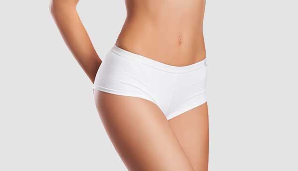 A close up image set of a woman wearing white underwear