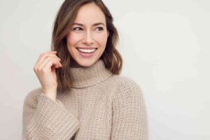 Woman with smooth forehead and youthful look after brow lift surgery in Austin, TX