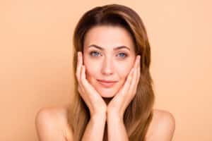 Woman with smooth forehead and lifted brows