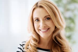 Woman with a refreshed facial appearance after facelift